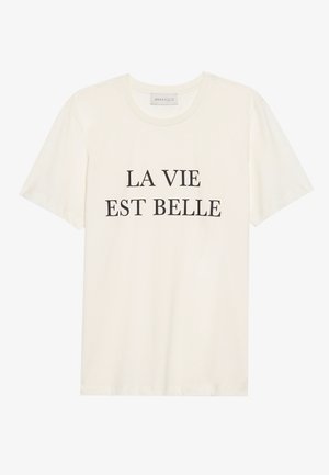 Kreminės spalvos medvilnės T-shirt su trumpomis rankovėmis ir apvaliu iškirpimu. Priekyje išskirtas centrinis juodas tekstas "LA VIE EST BELLE".