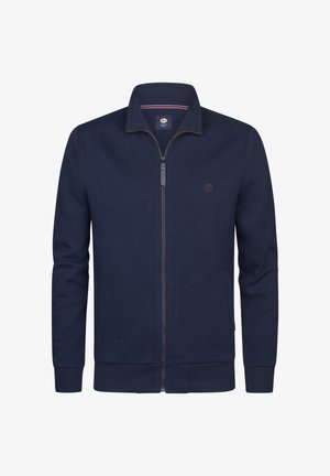 Marineblauw jack met ritssluiting, voorzien van een gestructureerd geometrisch patroon, geribbelde manchetten en zoom, een opstaande kraag en een logopatch op de borst.