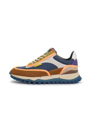 Multi-colored sneaker featuring a mix of suede and mesh materials, a chunky rubber sole, and distinct lacing system with vibrant accents.