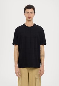 Armani Exchange Nyomott mintás póló - black