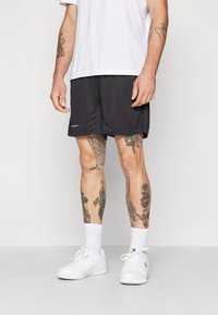 Champion TRAIN SHORTS LARGE LOGO - Sportovní kraťasy - black