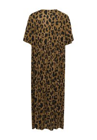 Robe en imprimé léopard marron avec des taches noires, dotée de manches courtes et d'une coupe ample avec une taille froncée. La longueur arrive sous le genou.