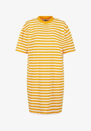 Randig t-shirtklänning med växlande gula och vita ränder, rund halsringning och korta ärmar, tillverkad av mjukt tyg.