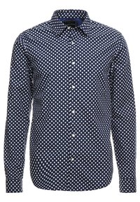 Navyblauwe overhemd met lange mouwen, knoopsluiting, witte stippen en een klassieke kraag.