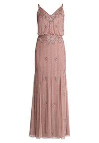 Blush pink evening gown with a loose bodice, intricate silver beadwork, and a floor-length skirt made of sheer tulle. Spaghetti straps.