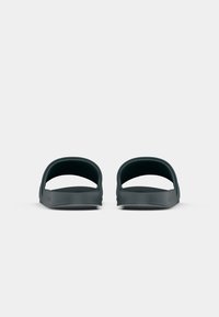 Calvin Klein Jeans SLIDE MONO - Mules - seaside aqua/white