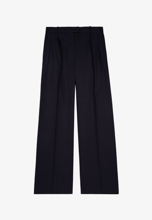 Pantalones negros de pierna ancha con una textura suave, que presentan un diseño de pliegues y una cinturilla estándar. Diseñados para un ajuste holgado.