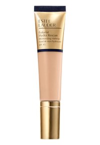 Estee Lauder Futurist Hydra Rescue Moisturizing Makeup in a beige tube with a gold and navy cap. SPF 45 label visible on the front.
