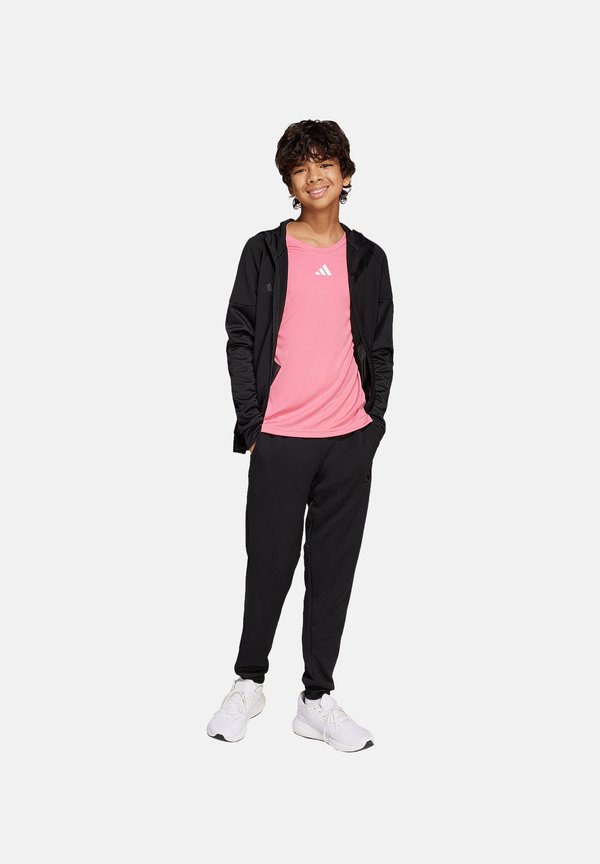 FUSSBALL - TEAMSPORT - TIRO - Jogginghose - schwarz