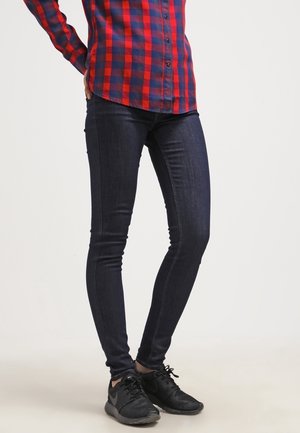 Vaqueros pitillo - rinsed denim