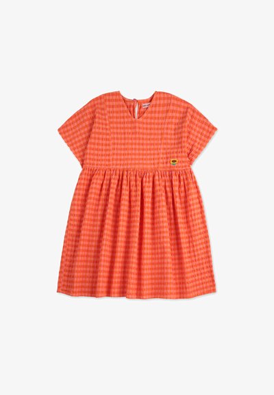 Orange gingham dress with short sleeves, round neck, and gathered skirt. Features a small floral embroidery on the hem. Lightweight fabric.