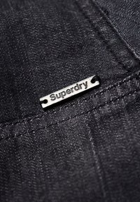 Superdry & Co Farkkumekko - black