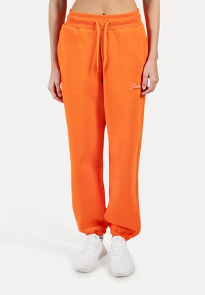 Orange sweatpants med elastisk talje og manchetter, prydet med en hvid logo-accents. Lavet af blødt, tykt stof for ekstra komfort.