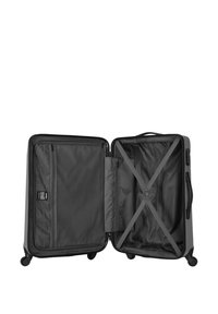 Black hard-shell suitcase with a handle, four wheels, and a spacious, textured fabric interior featuring a cross strap and zippered pocket.
