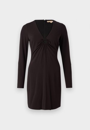 Robe noire à manches longues avec un décolleté en V profond et un accent circulaire au centre. Fabriquée en tissu lisse, avec une silhouette ajustée et une fermeture éclair au dos.