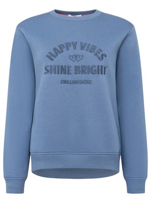 Blauer Sweatshirt mit gerippten Bündchen und Saum. Mit gesticktem Text "HAPPY VIBES SHINE BRIGHT" und Logo. Weiche, glatte Textur.