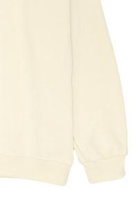 Felpa color crema realizzata in tessuto strutturato, con polsini e orlo a coste, dal taglio comodo. Senza marchi o motivi visibili.