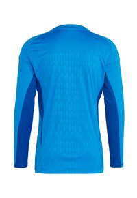 Koszula z długim rękawem w jasnym niebieskim kolorze, z fakturowanym wzorem w diamenty na plecach oraz jednolitymi ciemnoniebieskimi wstawkami po bokach.