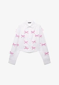 Unselected, bianco ottico