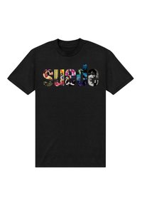 Czarny t-shirt z napisem "Suede" dużymi literami, wypełnionym kolorową kolażową sztuką przedstawiającą różnorodne twarze i abstrakcyjne kształty.