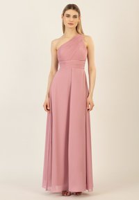 Langes, einseitiges Kleid aus zartem pinken Stoff. Verfügt über ein gerafftes Oberteil und einen fließenden Rock. Leichtes, glattes Material mit lockerer Passform.