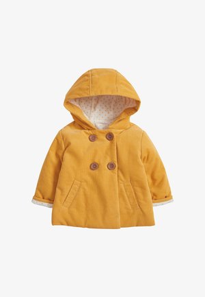 Gul børne hættejakke med dobbeltbrystede brune knapper, to forlommer og hvid foring med orange polkaprikker på ærmerne og hætten.