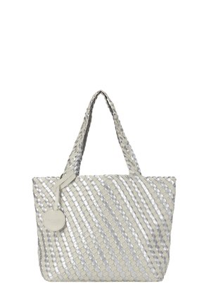 Woven tote bag in cream and silver tones, featuring dual handles, a round tag, and a structured shape with textured surface patterns.