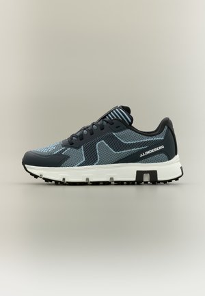 Zapatilla deportiva de malla en gris oscuro y azul claro, con cordones negros, suela blanca gruesa y logo de J.LINDEBERG en el lateral.