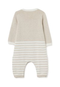 Monos de punto beige con escote redondo, mangas largas y la parte inferior a rayas. Textura suave y puños ajustados en muñecas y tobillos.