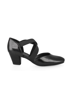 Black patent leather low heel shoe with rounded toe and two elastic crisscross straps across the instep.