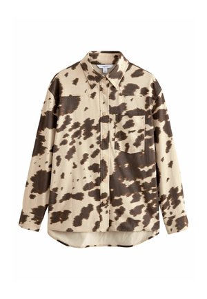 Beige button-up shirt with dark brown irregular cowhide pattern, long sleeves, pointed collar, and chest pocket on a white background.