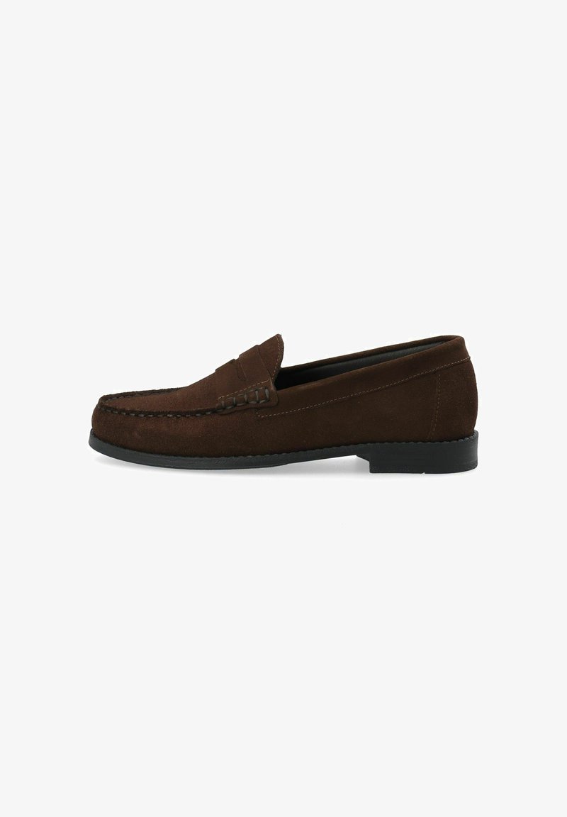 Brown suede loafers with a stitched moccasin toe, flat black rubber sole, and a decorative top strap and detail.