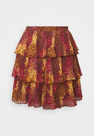 Gestufter Rock in Braun mit einem Blumenmuster in Gelb-, Pink- und Orangetönen. Hergestellt aus plissiertem Stoff mit weicher Textur.