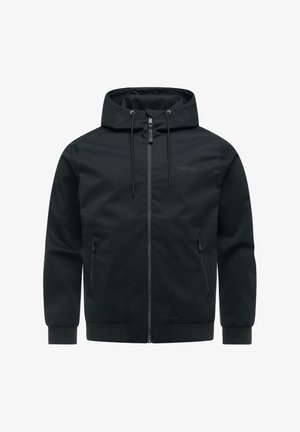 Veste noire à capuche avec fermeture éclair frontale, cordons de serrage, poches latérales zippées, et bords-côtes aux poignets et à l'ourlet.