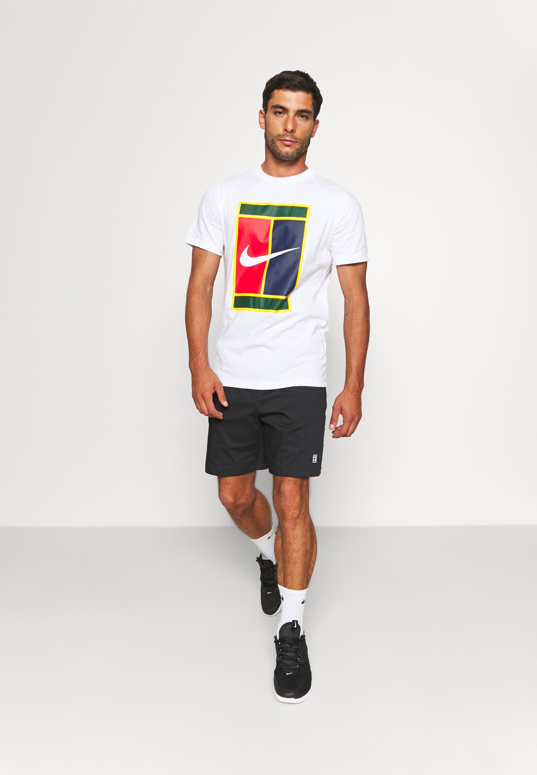 Nike Performance TEE HERITAGE LOGO - Camiseta estampada - white/blanco -  Zalando.es