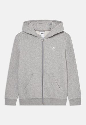 Grijze ritssluiting hoodie gemaakt van zacht fleecemateriaal, met een kangoeroezak, ribgebreide manchetten en een klein wit logo op de borst.