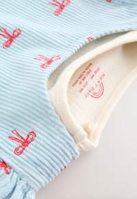 Unselected, blue bow