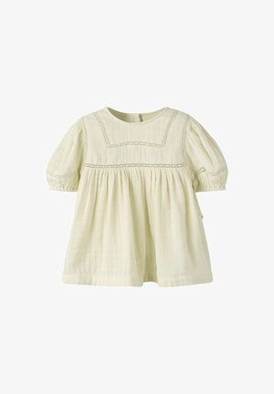 Rochie pentru bebeluși de culoare crem cu mâneci scurte bufante, tiv decorativ din dantelă și material adunat sub piept pentru o potrivire lejeră.