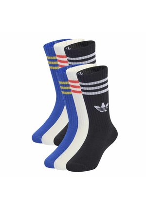 Pięć par skarpetek Adidas typu crew w czarnym kolorze z białymi paskami i logo, białe z czerwonymi paskami oraz niebieskie z żółtymi paskami.