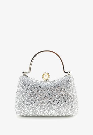 Silberne Handtasche mit runder Form, bedeckt mit Strasssteinen, mit einem metallischen Griff und einem dekorativen Perlenverschluss.