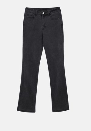 Sorte denimbukser med utsvingt ben og en glatt tekstur, fem lommer og knappelukking i midjen.