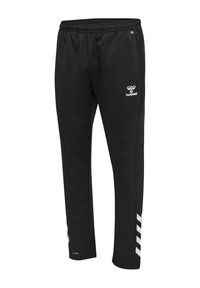 Pantalon de sport noir avec ceinture élastique, logo Hummel blanc sur la cuisse et bandes blanches inclinées près de la cheville gauche.