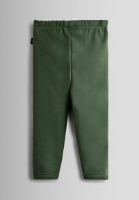 Zöld leggings sima, rugalmas anyagból. Rugalmas derékpánttal rendelkezik és nincs látható varrása, így tiszta, testhezálló megjelenést biztosít.