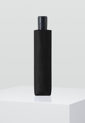 Black insulated water bottle with a matte finish and a dark blue lid, featuring a circular button on top for easy opening.