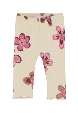 Cremfarbene Rippstrumpfhose für Babys mit rosa, lila und braunen Blumenmustern sowie einem gewellten Saum.