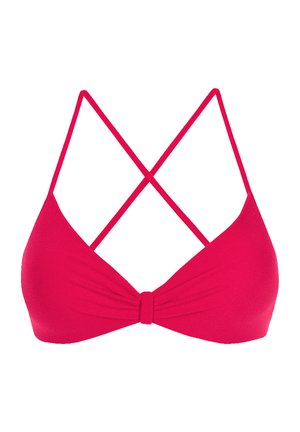 Jasnoróżowy biustonosz bikini z wykręconym przodem, skrzyżowanymi ramiączkami z tyłu oraz gładką, elastyczną teksturą materiału.