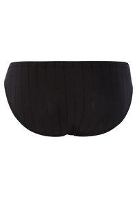 Svarta simbriefs med ribbad textur och en enkel, sömlös design. Midjebandet sitter bekvämt vid den naturliga midjehöjden.