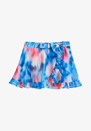Short, flared wrap skirt in a tie-dye pattern of blue, pink, and white. Features a ruffled hem and a bow detail on the waistband.