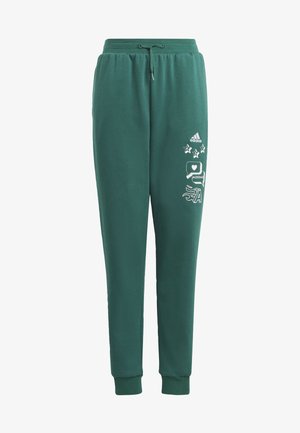 Pantalones de chándal de algodón verde con cinturilla elástica, cordón y puños acanalados. Presenta estampados gráficos en blanco, incluyendo un logo y patrones de estrellas.
