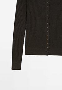 Dark brown ribbed cardigan with long sleeves, featuring a button-down front and matching buttons, textured fabric, and a fitted hem.